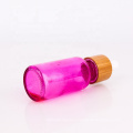 custom made color 30ml essential oil glass bottle with wood dropper lid